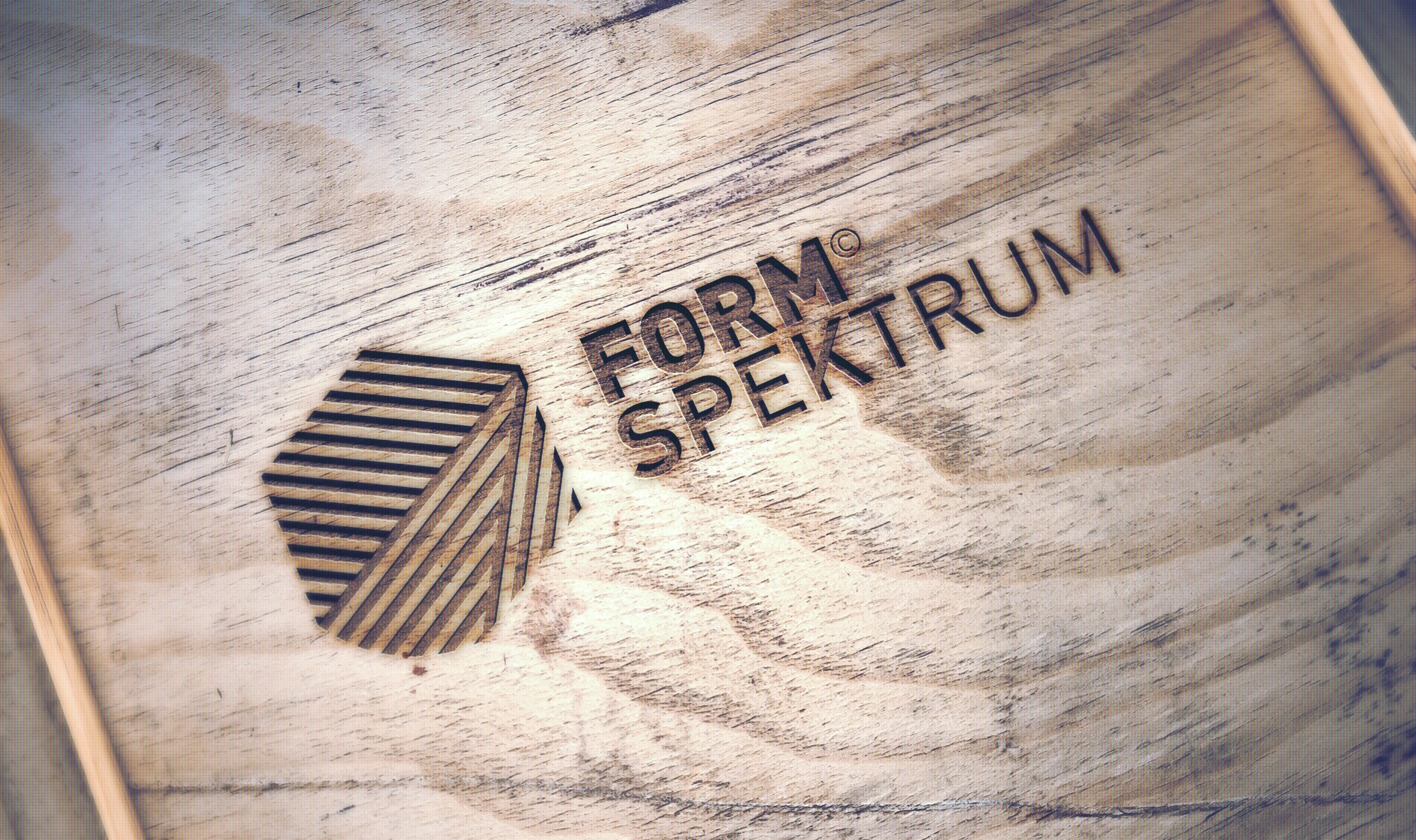 FORMSPEKTRUM GmbH, Logoentwicklung, Corporate Design, Logo Wort-Bildmarke, Lasercut Mood